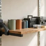 A bright home workshop wall with vertical metal shelf standards