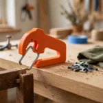 A bright home workshop scene on a light oak workbench
