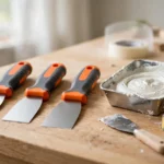 A bright home workshop scene on a light oak workbench